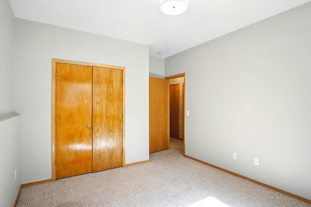 4939 S Prairie View Ave, Battlefield, MO 65619 - unfurnished bedroom with light colored carpet and a closet