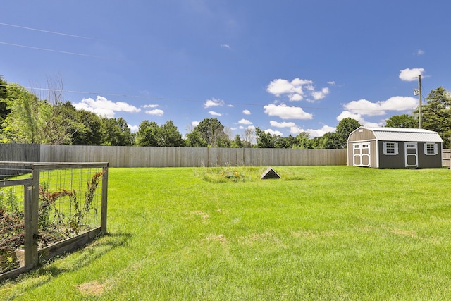 1020 Berkley Dr, Marshfield, MO 65706 - view of yard with a shed and a vegetable garden