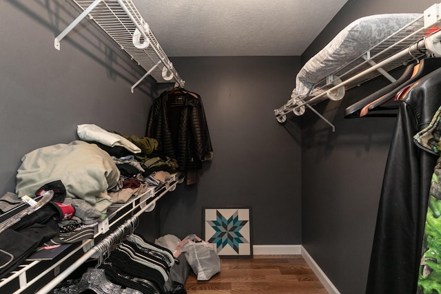 1020 Berkley Dr, Marshfield, MO 65706 - walk in closet with wood finished floors