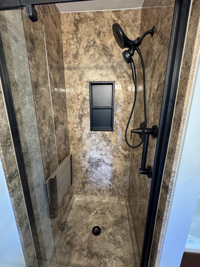 1020 Berkley Dr, Marshfield, MO 65706 - bathroom with a shower stall and a textured ceiling