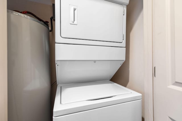300 Glory Rd Unit 2, Branson, MO 65616 - laundry area with stacked washer and clothes dryer and water heater