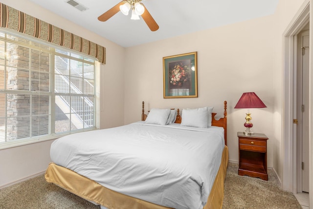 300 Glory Rd Unit 2, Branson, MO 65616 - bedroom with light carpet and ceiling fan
