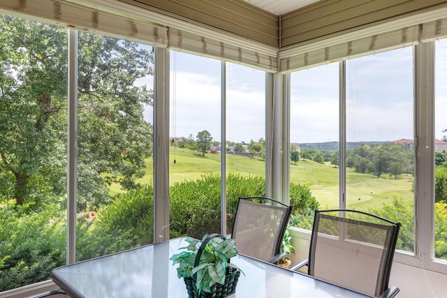 300 Glory Rd Unit 2, Branson, MO 65616 - sunroom with golf course view, healthy amount of natural light, and outdoor dining space