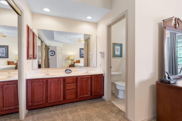 300 Glory Rd Unit 2, Branson, MO 65616 - bathroom featuring connected bathroom, double vanity, and carpet