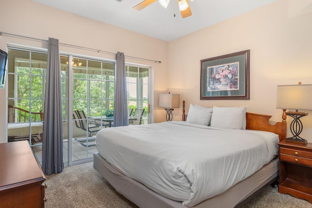 300 Glory Rd Unit 2, Branson, MO 65616 - carpeted bedroom with access to outside and ceiling fan
