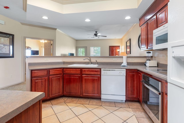 300 Glory Rd Unit 2, Branson, MO 65616 - kitchen with white appliances, crown molding, dark brown cabinets, recessed lighting, and ceiling fan