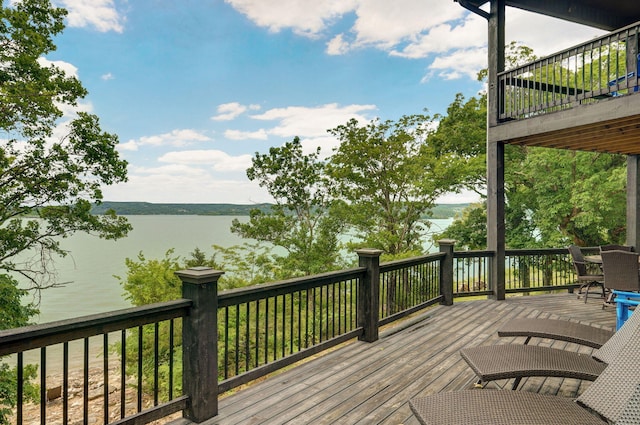 199 Cardinal Rd, Hollister, MO 65672 - wooden deck featuring a water view and outdoor dining space
