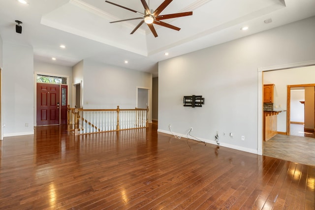 2661 E Ridgewood Dr, Springfield, MO 65804 - unfurnished room with a raised ceiling, ceiling fan, hardwood / wood-style floors, and recessed lighting