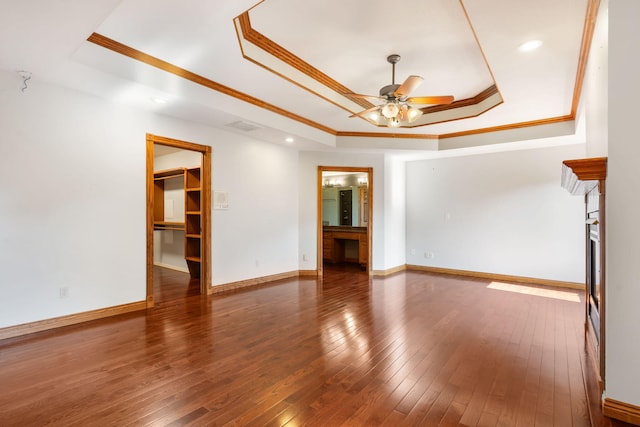 2661 E Ridgewood Dr, Springfield, MO 65804 - unfurnished room with a tray ceiling, ceiling fan, ornamental molding, wood-type flooring, and recessed lighting