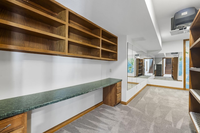 2661 E Ridgewood Dr, Springfield, MO 65804 - unfurnished office with built in desk and light colored carpet