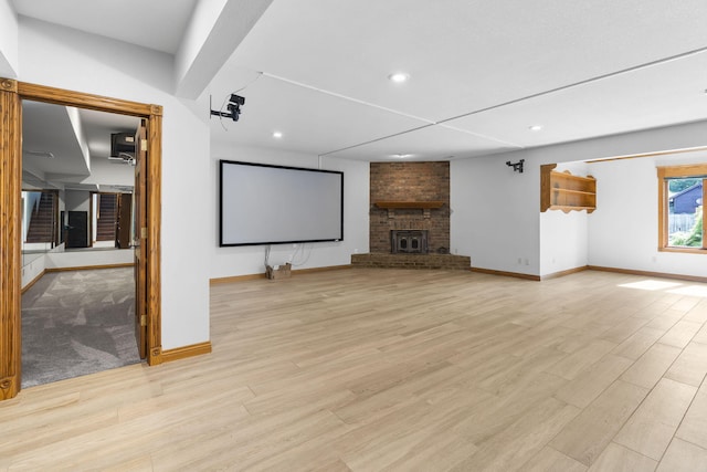 2661 E Ridgewood Dr, Springfield, MO 65804 - cinema room with a fireplace, recessed lighting, and light wood-type flooring