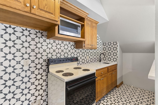 2661 E Ridgewood Dr, Springfield, MO 65804 - kitchen featuring white range with electric cooktop, stainless steel microwave, light countertops, light floors, and decorative backsplash