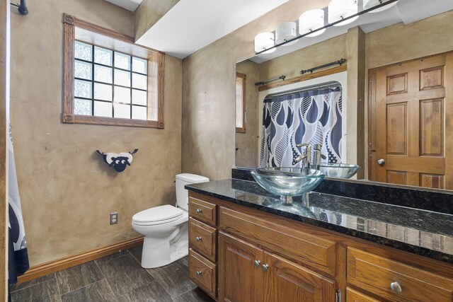 2661 E Ridgewood Dr, Springfield, MO 65804 - bathroom with vanity and toilet