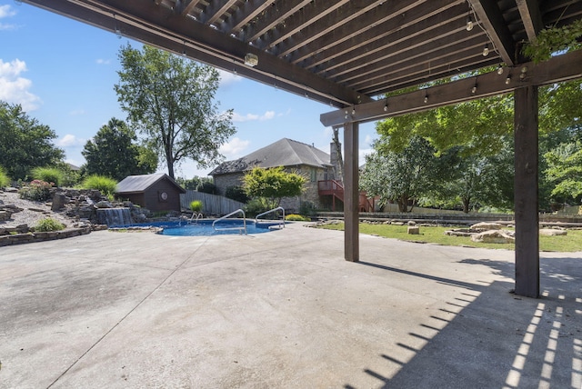 2661 E Ridgewood Dr, Springfield, MO 65804 - view of patio featuring a storage unit