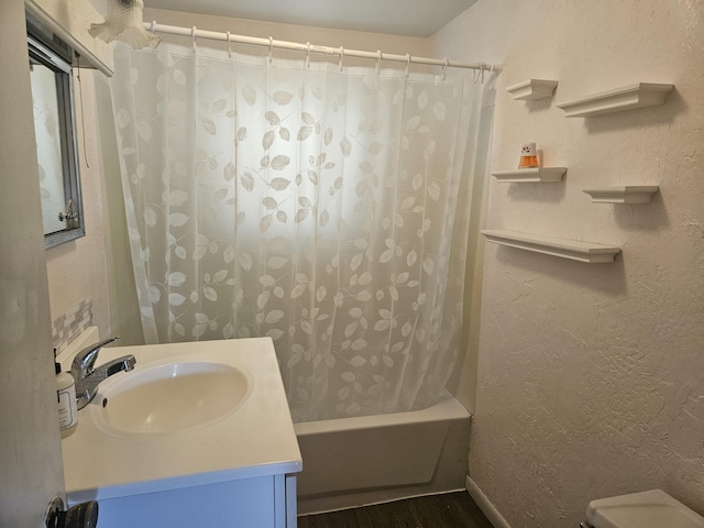 1713 Wall Rd, Mountain Grove, MO 65711 - full bathroom with shower / bath combination with curtain, vanity, wood finished floors, and a textured wall