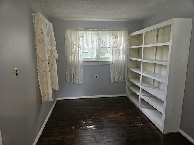 1713 Wall Rd, Mountain Grove, MO 65711 - empty room featuring hardwood / wood-style floors and a textured ceiling