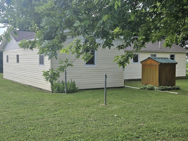 1713 Wall Rd, Mountain Grove, MO 65711 - view of green lawn with a storage unit
