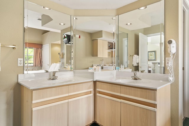 2800 Green Mountain Dr Unit 130A & D, Branson, MO 65616 - bathroom featuring double vanity and recessed lighting