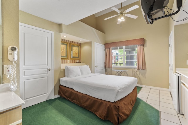 2800 Green Mountain Dr Unit 130A & D, Branson, MO 65616 - bedroom with light tile patterned floors, high vaulted ceiling, and ceiling fan
