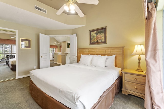 2800 Green Mountain Dr Unit 130A & D, Branson, MO 65616 - bedroom featuring dark carpet, multiple windows, and ceiling fan
