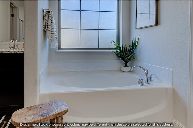 703 N Baywood Dr, Nixa, MO 65714 - full bathroom featuring vanity and a bath