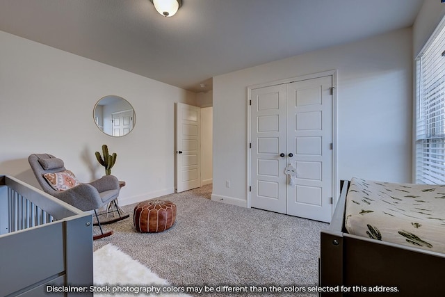 703 N Baywood Dr, Nixa, MO 65714 - carpeted bedroom featuring baseboards and a closet