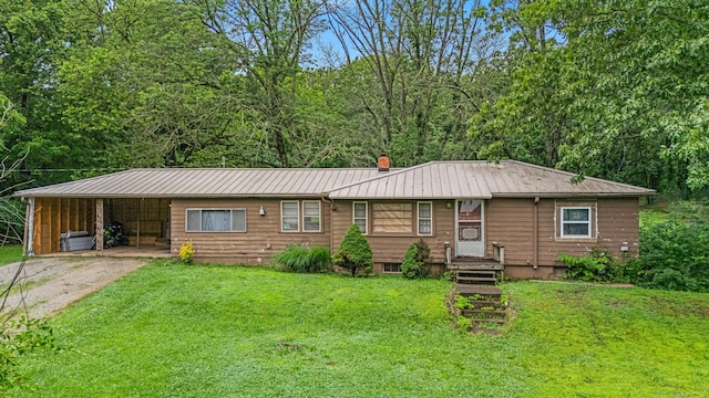 1215 Lanton Rd, West Plains, MO 65775 - ranch-style home with a front lawn, a metal roof, a carport, and driveway