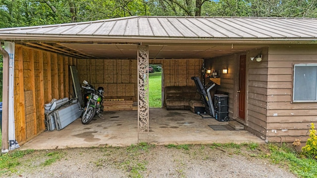 1215 Lanton Rd, West Plains, MO 65775 - view of parking / parking lot featuring a carport, dirt driveway, and an outbuilding