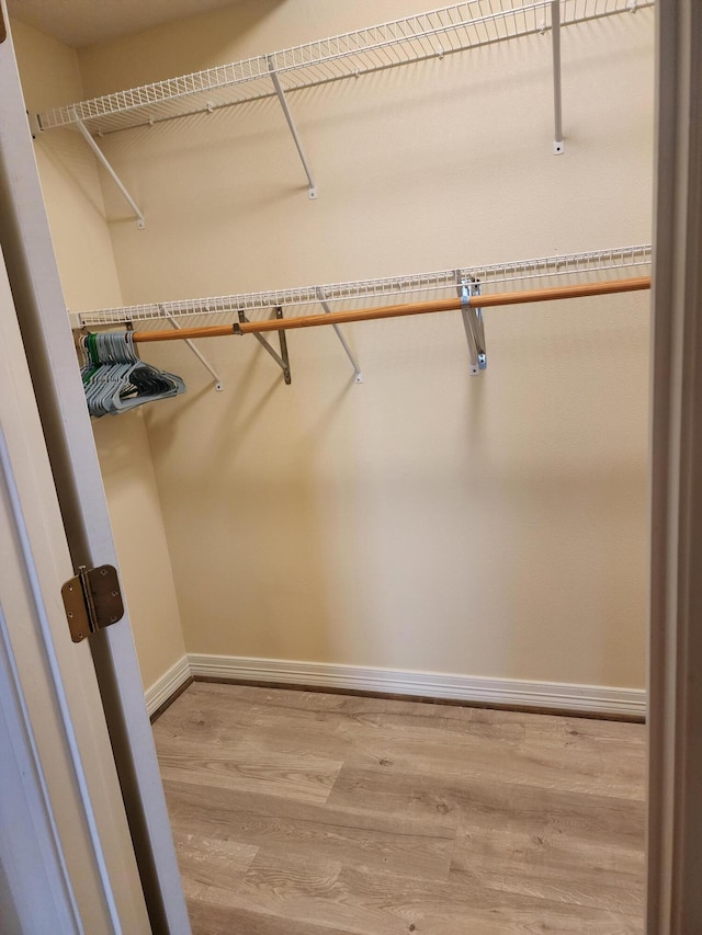 180 Grace Chapel Rd Unit 228, Blue Eye, MO 65611 - spacious closet featuring wood finished floors