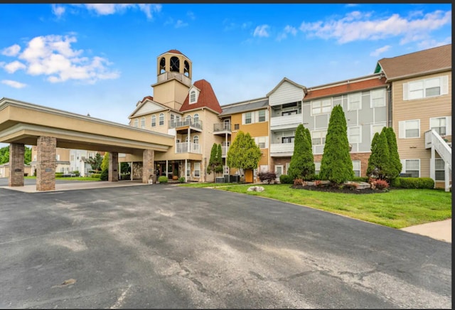 180 Grace Chapel Rd Unit 228, Blue Eye, MO 65611 - view of building exterior featuring covered parking