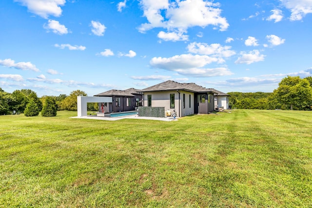 6298 E Summit View Dr, Springfield, MO 65809 - back of property with stucco siding and a yard