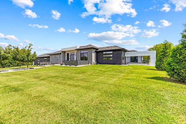 6298 E Summit View Dr, Springfield, MO 65809 - prairie-style house with a front lawn and stucco siding