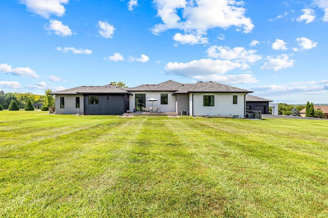 6298 E Summit View Dr, Springfield, MO 65809 - rear view of property featuring a yard, a patio, a garage, and driveway