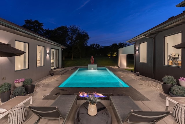 6298 E Summit View Dr, Springfield, MO 65809 - pool at twilight with a patio and an outdoor pool