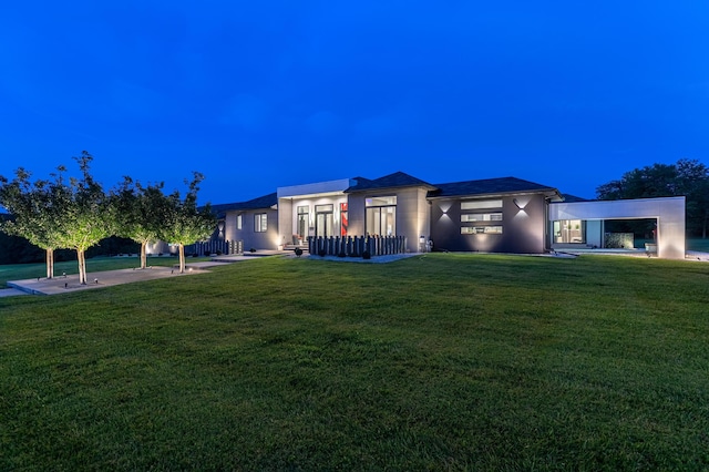6298 E Summit View Dr, Springfield, MO 65809 - rear view of house with a lawn and stucco siding