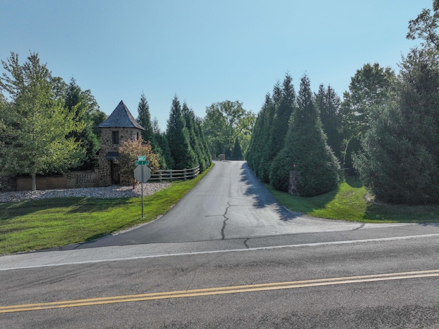 6298 E Summit View Dr, Springfield, MO 65809 - view of asphalt road with traffic signs