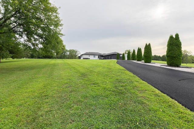 6298 E Summit View Dr, Springfield, MO 65809 - view of front facade with a front lawn and asphalt driveway