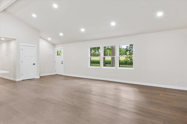 654 Rochester Rd, Sparta, MO 65753 - spare room with wood finished floors, recessed lighting, and high vaulted ceiling
