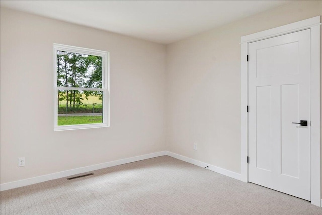 654 Rochester Rd, Sparta, MO 65753 - unfurnished room with light colored carpet