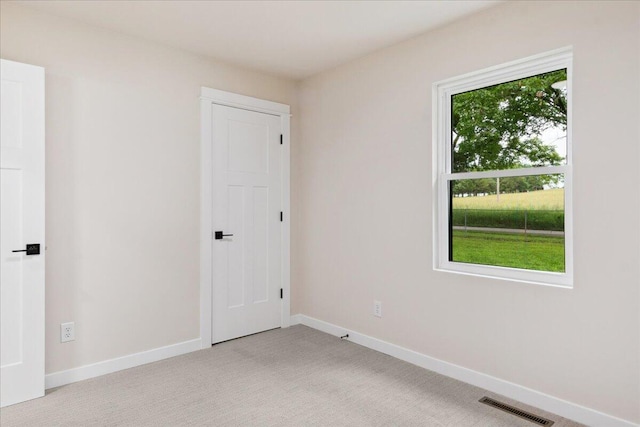 654 Rochester Rd, Sparta, MO 65753 - spare room with light carpet and baseboards
