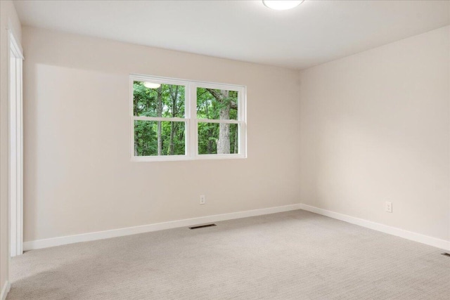 654 Rochester Rd, Sparta, MO 65753 - carpeted empty room featuring baseboards