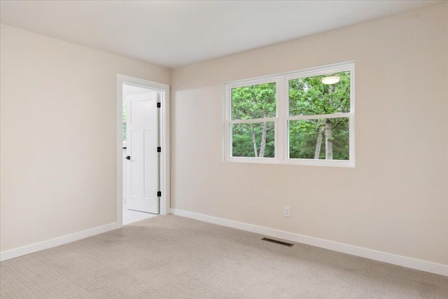 654 Rochester Rd, Sparta, MO 65753 - spare room featuring baseboards and carpet flooring