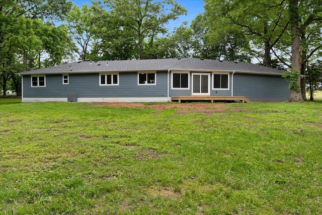 654 Rochester Rd, Sparta, MO 65753 - rear view of property featuring a lawn