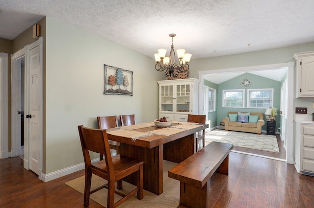 3711 W Farm Road 14, Brighton, MO 65617 - dining space with wood finished floors, a chandelier, lofted ceiling, and a textured ceiling
