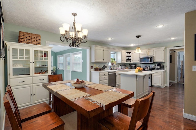 3711 W Farm Road 14, Brighton, MO 65617 - dining area featuring a chandelier, dark wood finished floors, a textured ceiling, and recessed lighting