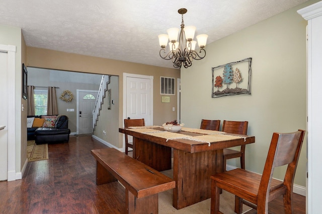 3711 W Farm Road 14, Brighton, MO 65617 - dining room with wood finished floors, a chandelier, and stairway