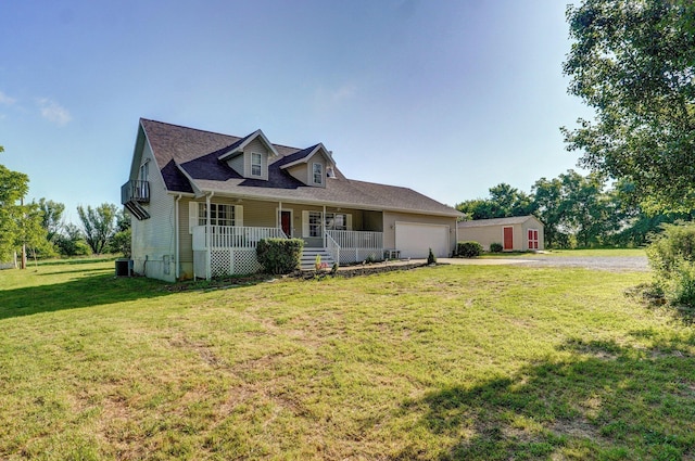 3711 W Farm Road 14, Brighton, MO 65617 - new england style home featuring covered porch, driveway, a garage, and a front yard