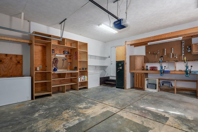 3711 W Farm Road 14, Brighton, MO 65617 - garage featuring a workshop area and a garage door opener