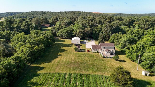 3711 W Farm Road 14, Brighton, MO 65617 - aerial view of property and surrounding area featuring a heavily wooded area