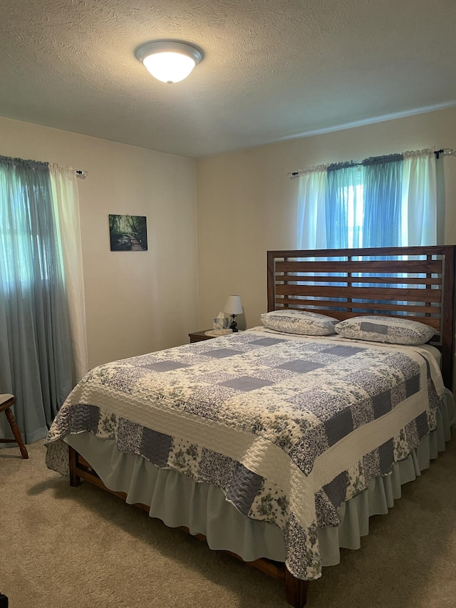 2105 Oakridge Dr, Ava, MO 65608 - carpeted bedroom featuring a textured ceiling